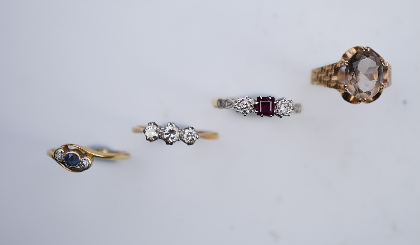 Four gem-set rings